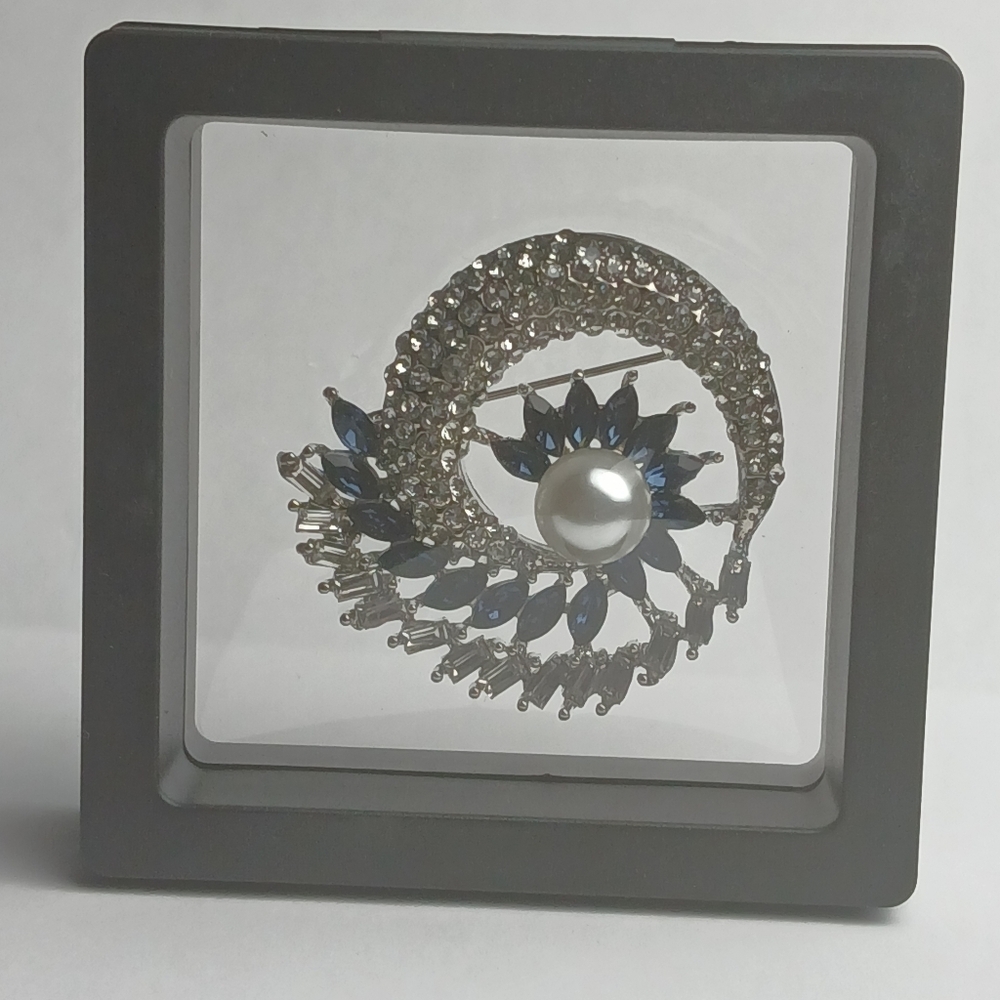 Elegant Silver-Tone Brooch with Blue Crystals and Pearl Accent